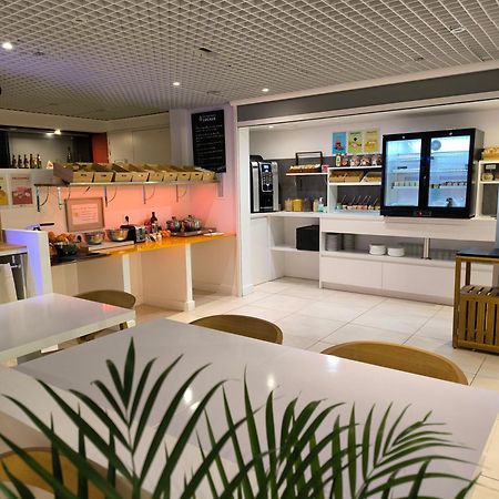 Brit Hotel Porte D'Espagne Perpignan Bagian luar foto