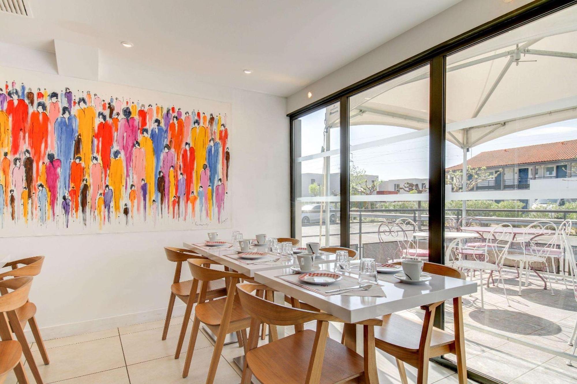 Brit Hotel Porte D'Espagne Perpignan Bagian luar foto