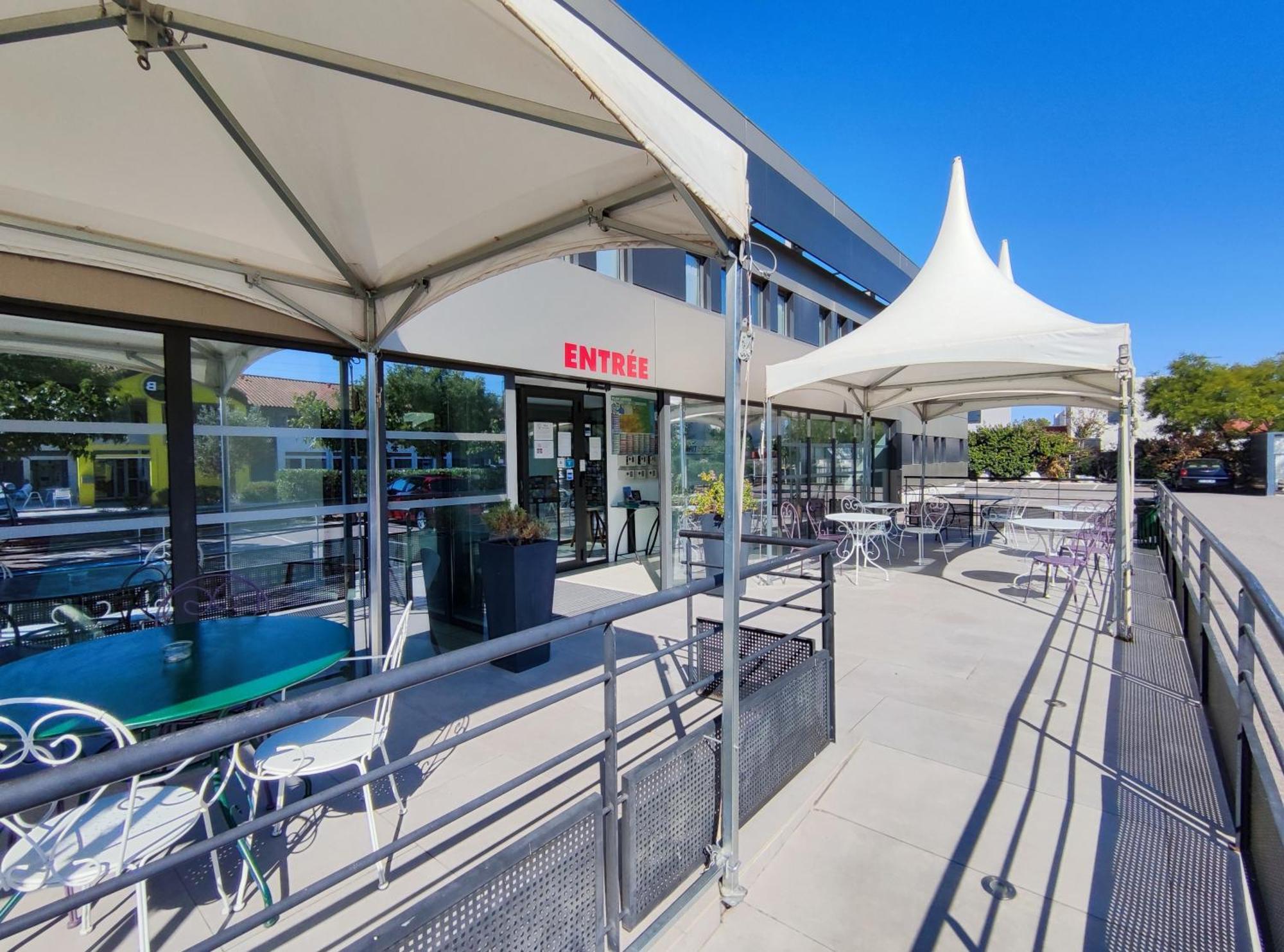 Brit Hotel Porte D'Espagne Perpignan Bagian luar foto