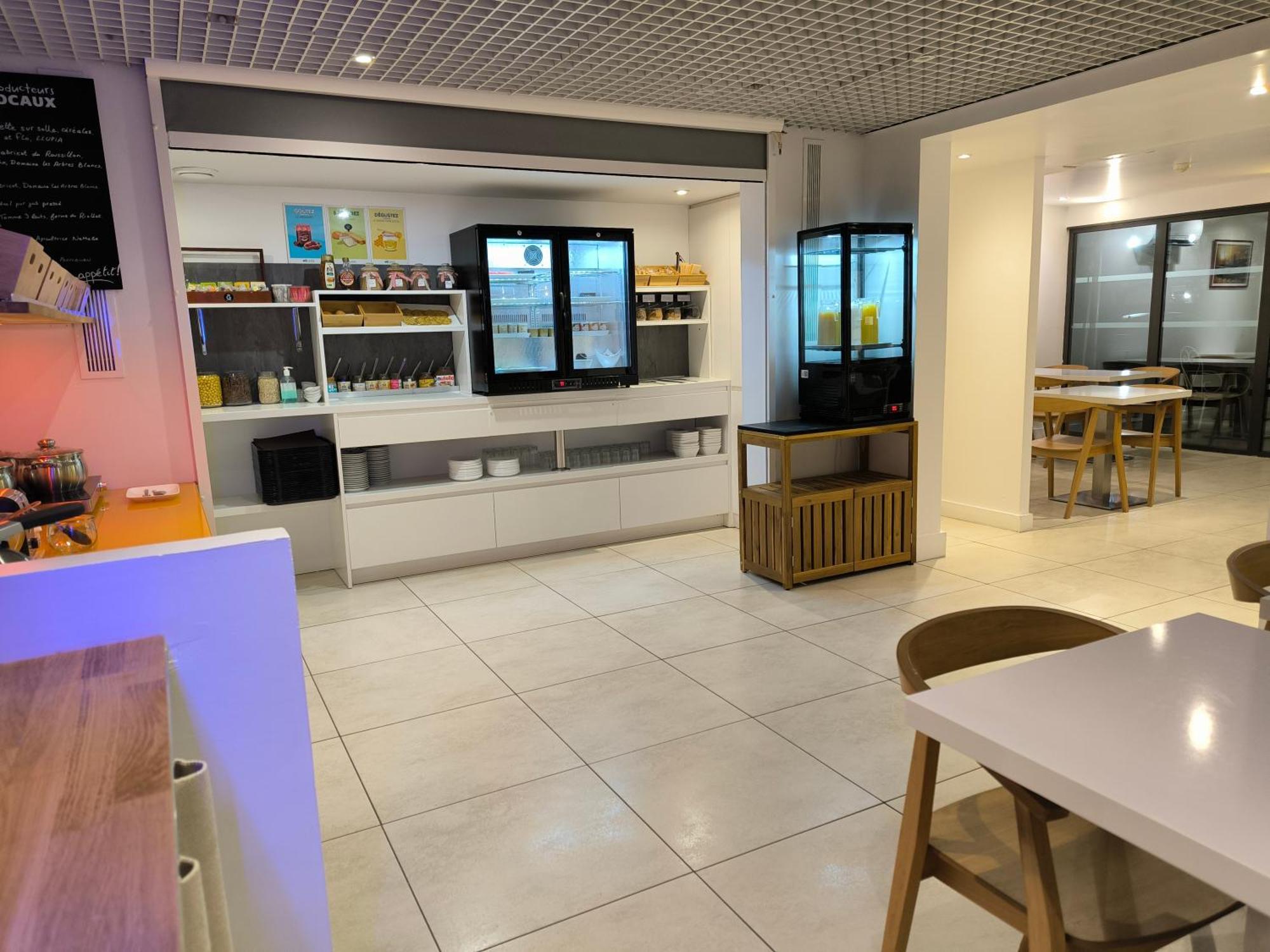 Brit Hotel Porte D'Espagne Perpignan Bagian luar foto
