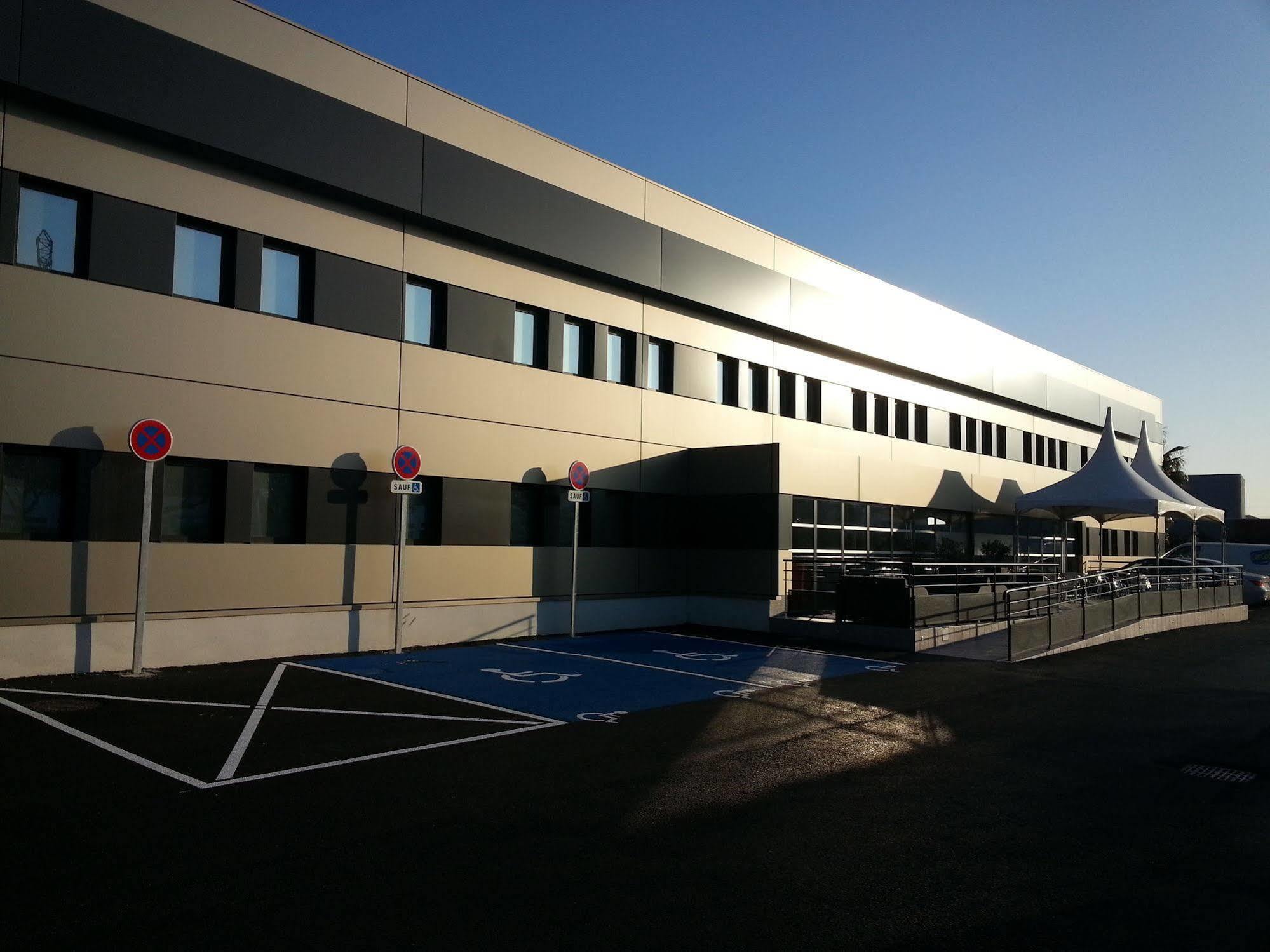 Brit Hotel Porte D'Espagne Perpignan Bagian luar foto